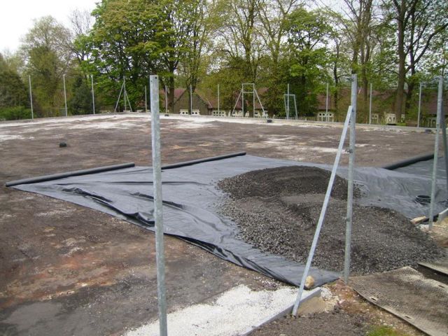 Shale_removed_and_start_of_covering_membrane_with_stone